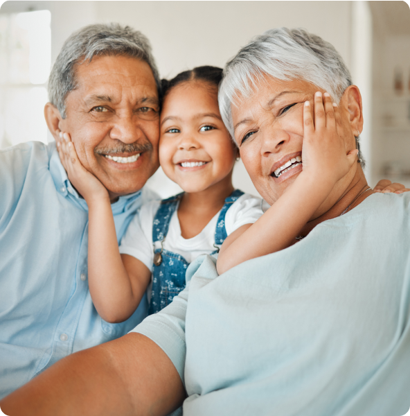 shot-of-grandparents-bonding-with-their-granddaughter-on-a-sofa-at-home-gm1385436395-444193241_phrase=happy&searchscope=imagefilm